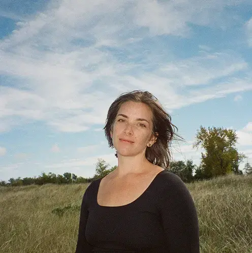 Olive standing in the wind